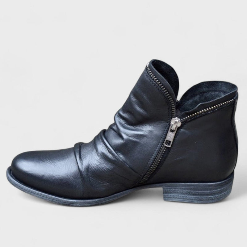 Close-up of the comfort-cushioned interior and ergonomic sole of a women's orthopedic boot