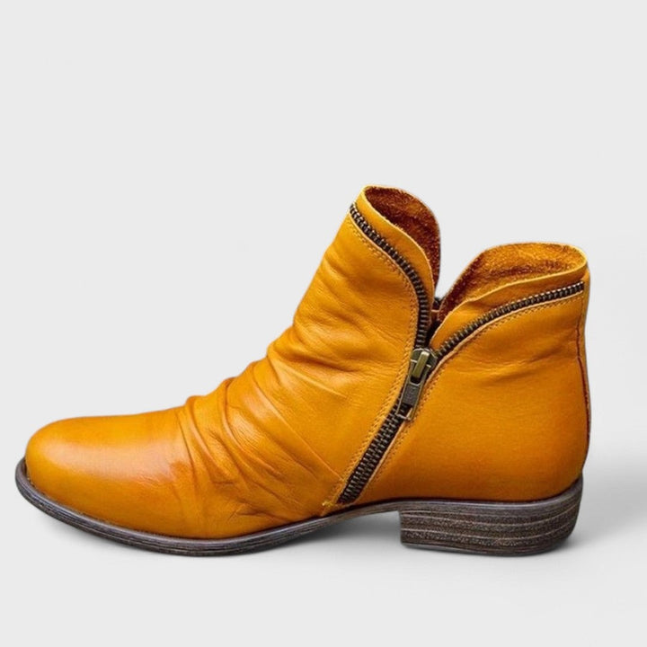 Women's orthopedic boot displayed in multiple color options including purple, black, blue, red, yellow, and green