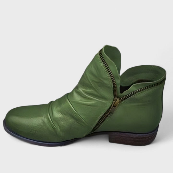 Overhead flat lay of women's orthopedic boots showing upper detailing and overall design