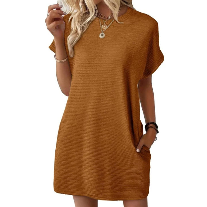 Full-length view of the Maggie mini dress in Dark Brown showing the relaxed silhouette