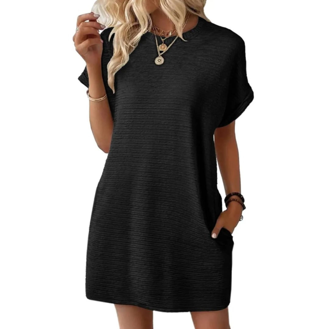 Flat lay of the Maggie mini dress in Rose Red displaying the crewneck and rolled cuff sleeves