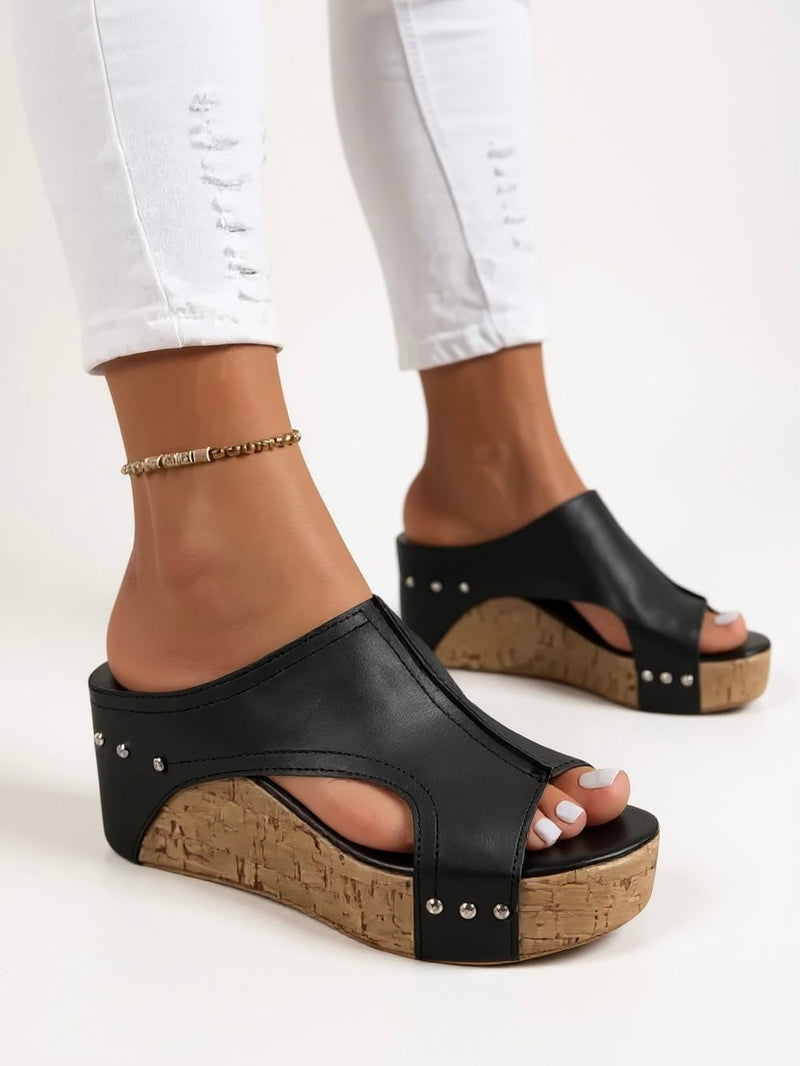 Magnolia wedge slide sandals in brown, front three-quarter angle highlighting cushioned footbed
