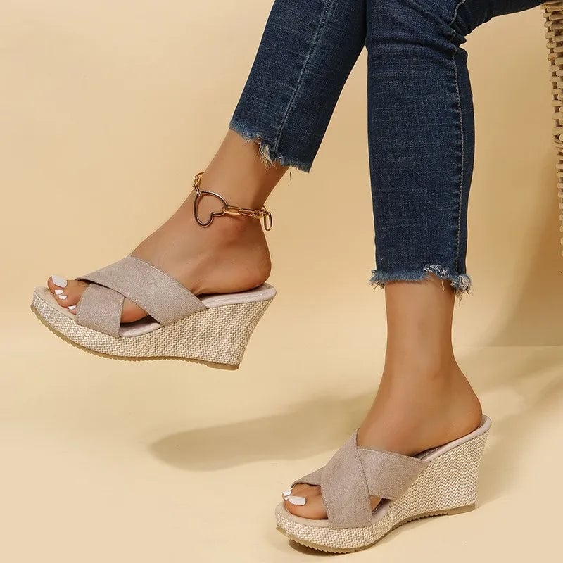 Close-up of Magnolia wedge sandal heel and sole construction in black