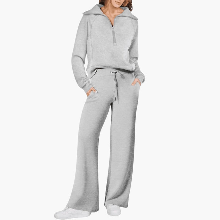 Close-up of the zip-up hoodie lounge set showing the adjustable front closure and drawstring waist detail
