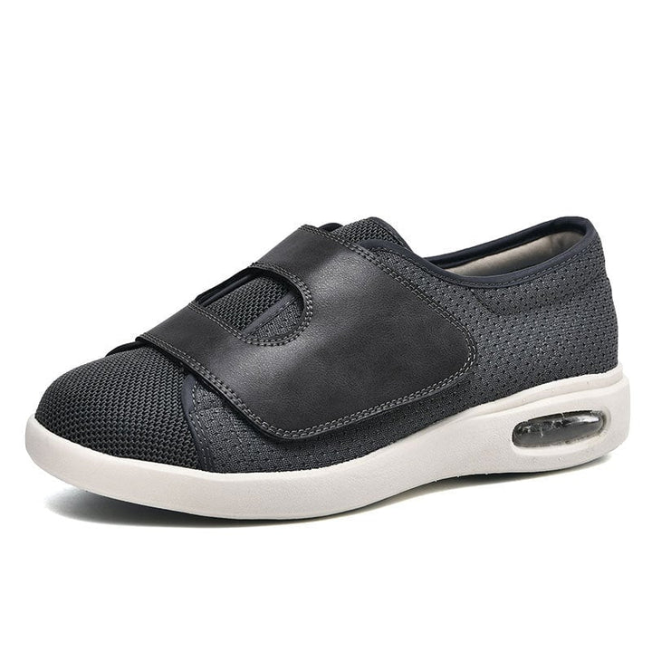 Top-down view of Magnus diabetic walking shoes with removable insole partially lifted to show depth
