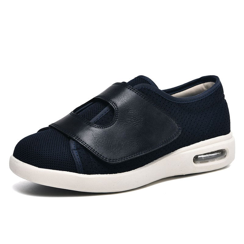 Close-up of Magnus walking shoe adjustable strap closure and mesh upper detail