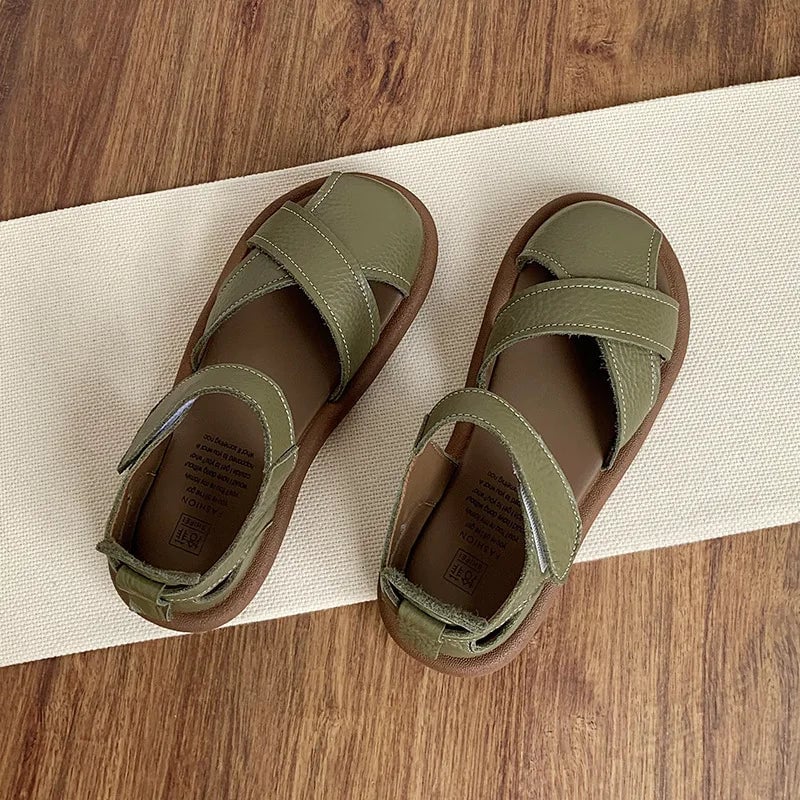 Lifestyle shot of Maisie women's sandals in creamy white worn with casual summer outfit