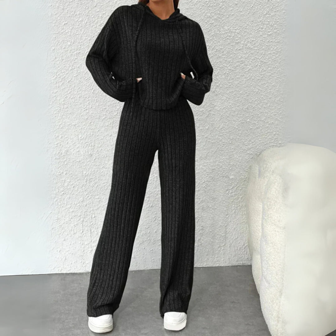 Full-length view of a minimalist hooded sweat set with relaxed silhouette, perfect for lounging or casual outings