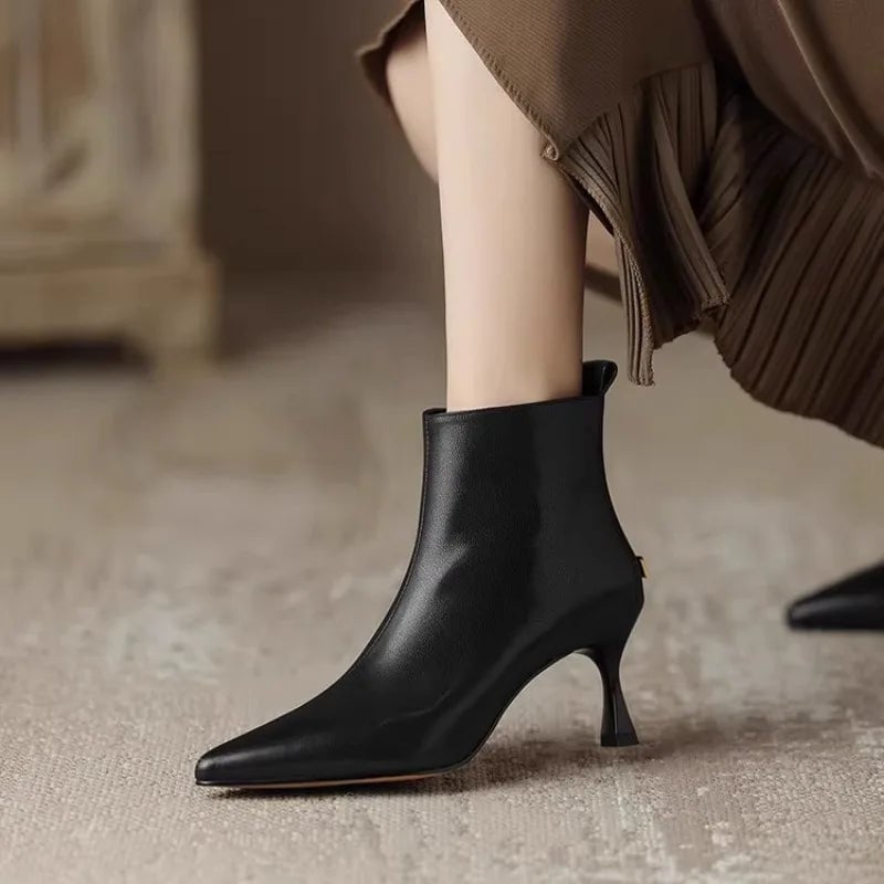 Maja luxe kitten boots in black with pointed toe and slender kitten heel, front view