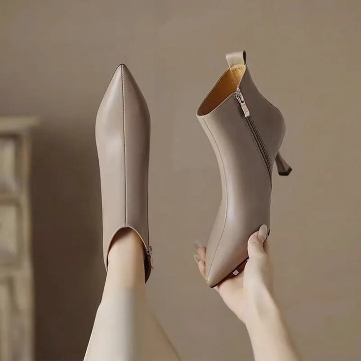 Maja kitten boots in khaki shown from a three-quarter angle highlighting the elegant silhouette