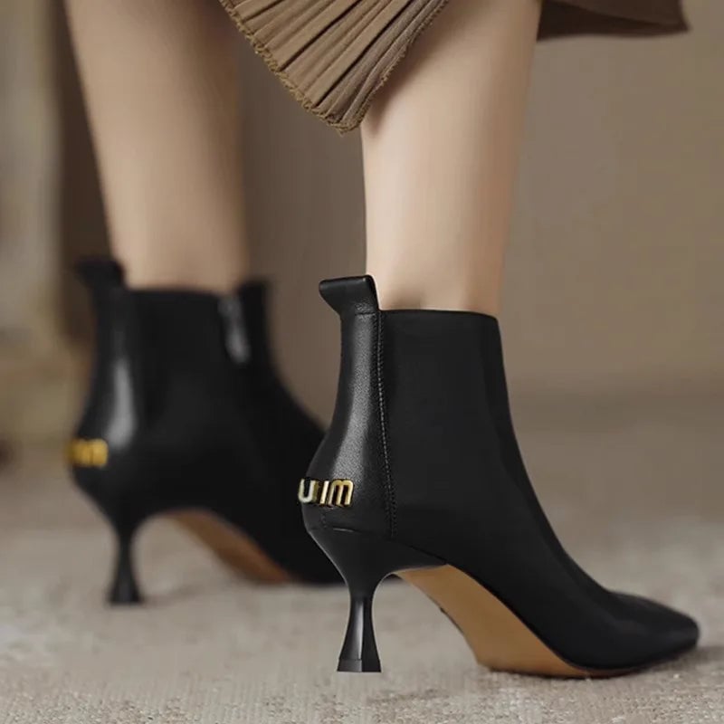 Close-up of the pointed toe and kitten heel on the Maja boots in brown