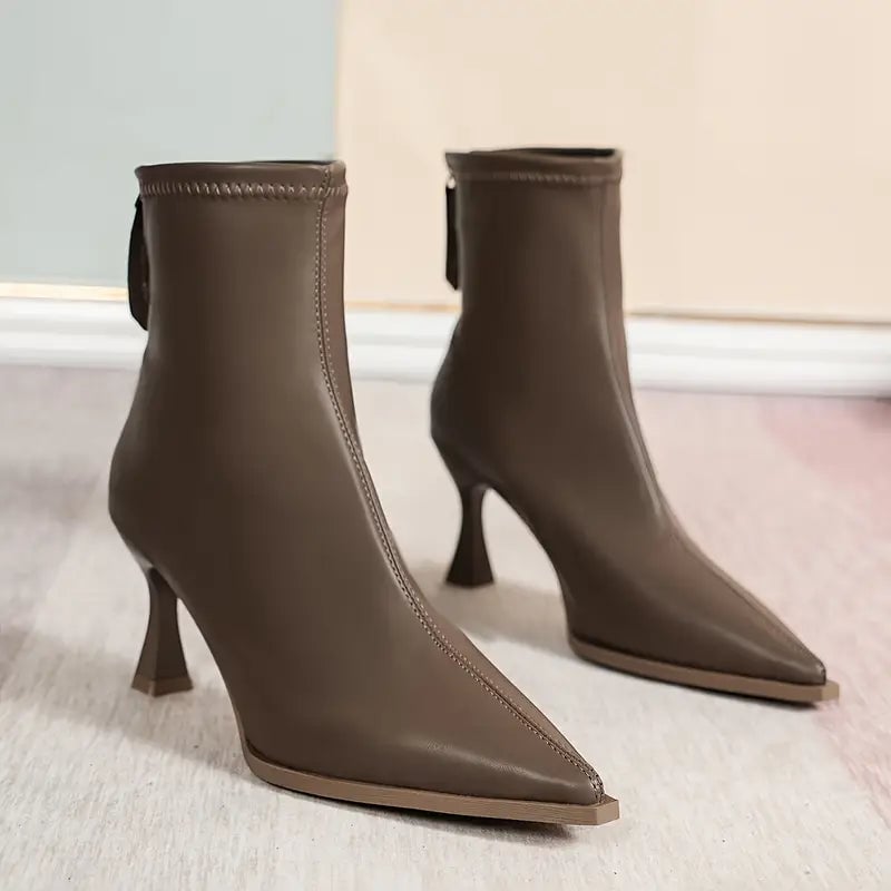 Maja kitten boots in black styled with a midi dress for an evening look