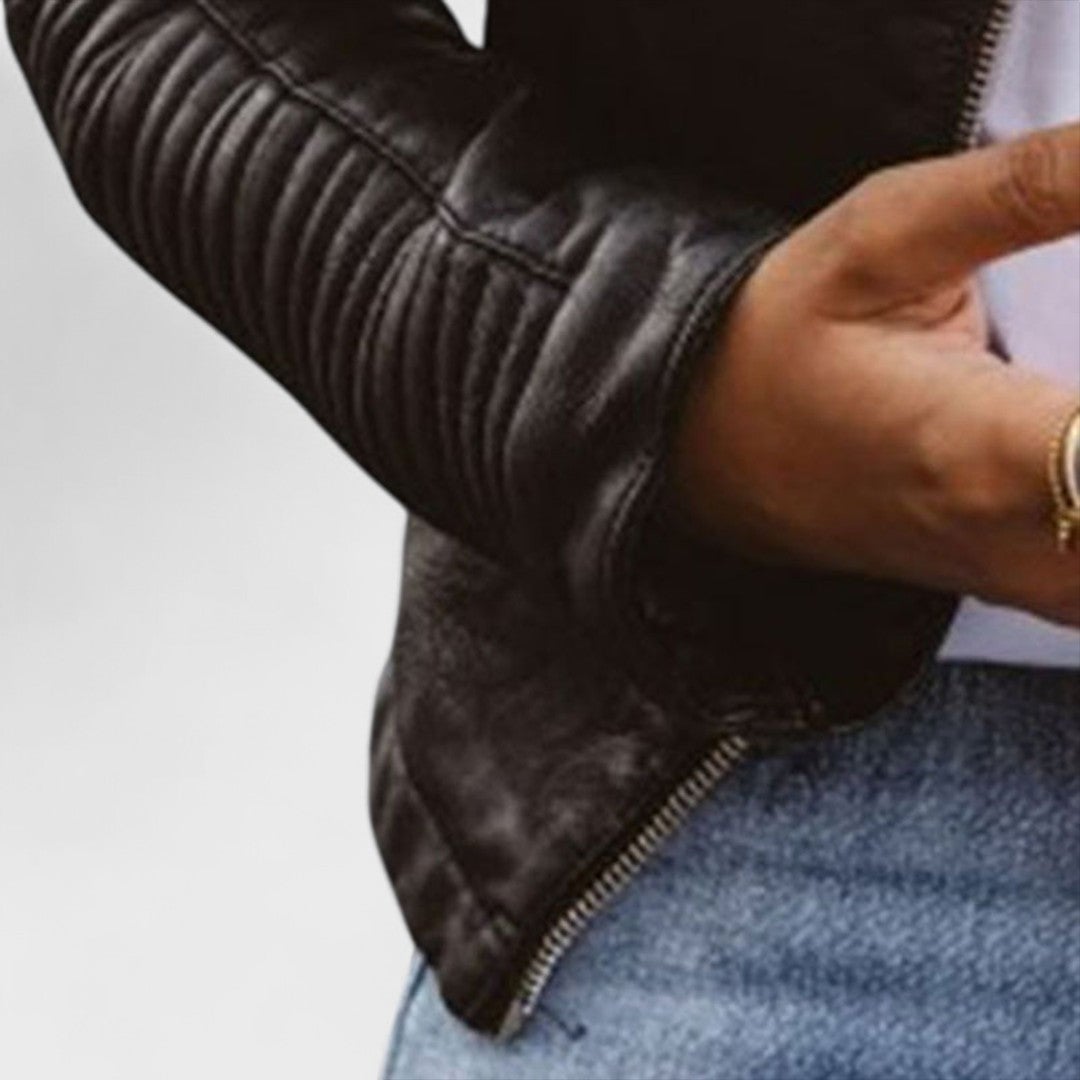 Side profile of model wearing the black elegant jacket highlighting the flattering fit
