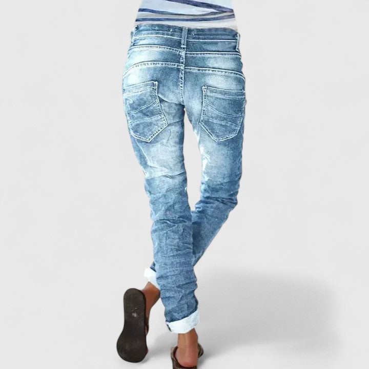 Back view of Marcella wide leg distressed jeans showing relaxed silhouette