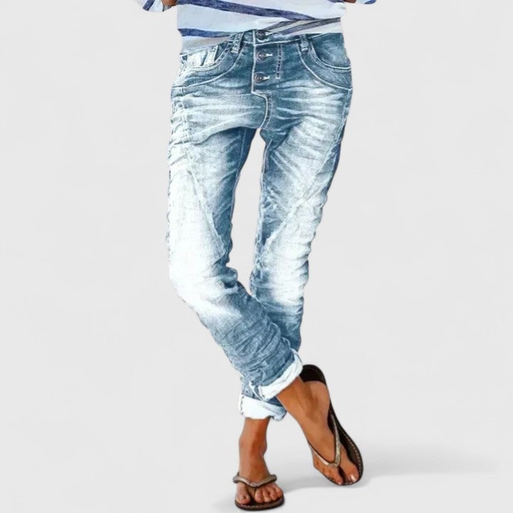 Side view of Marcella mid-rise wide leg jeans with cuffed hem styling