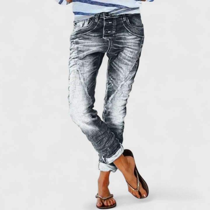 Detail shot of cuffed hem on Marcella distressed wide leg denim jeans