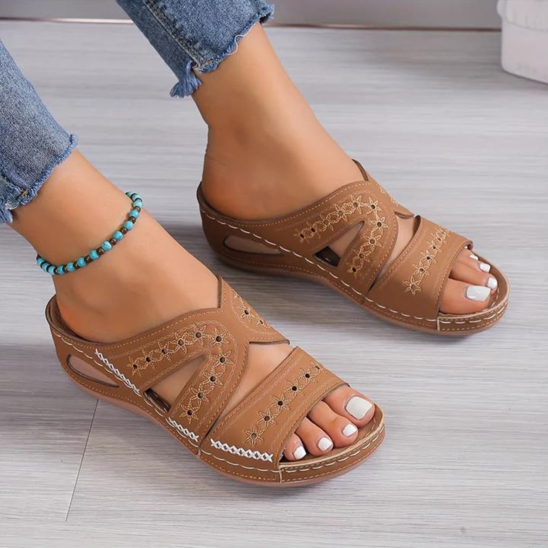 Maren orthopedic sandal in pink displayed at a slight angle to show sole profile