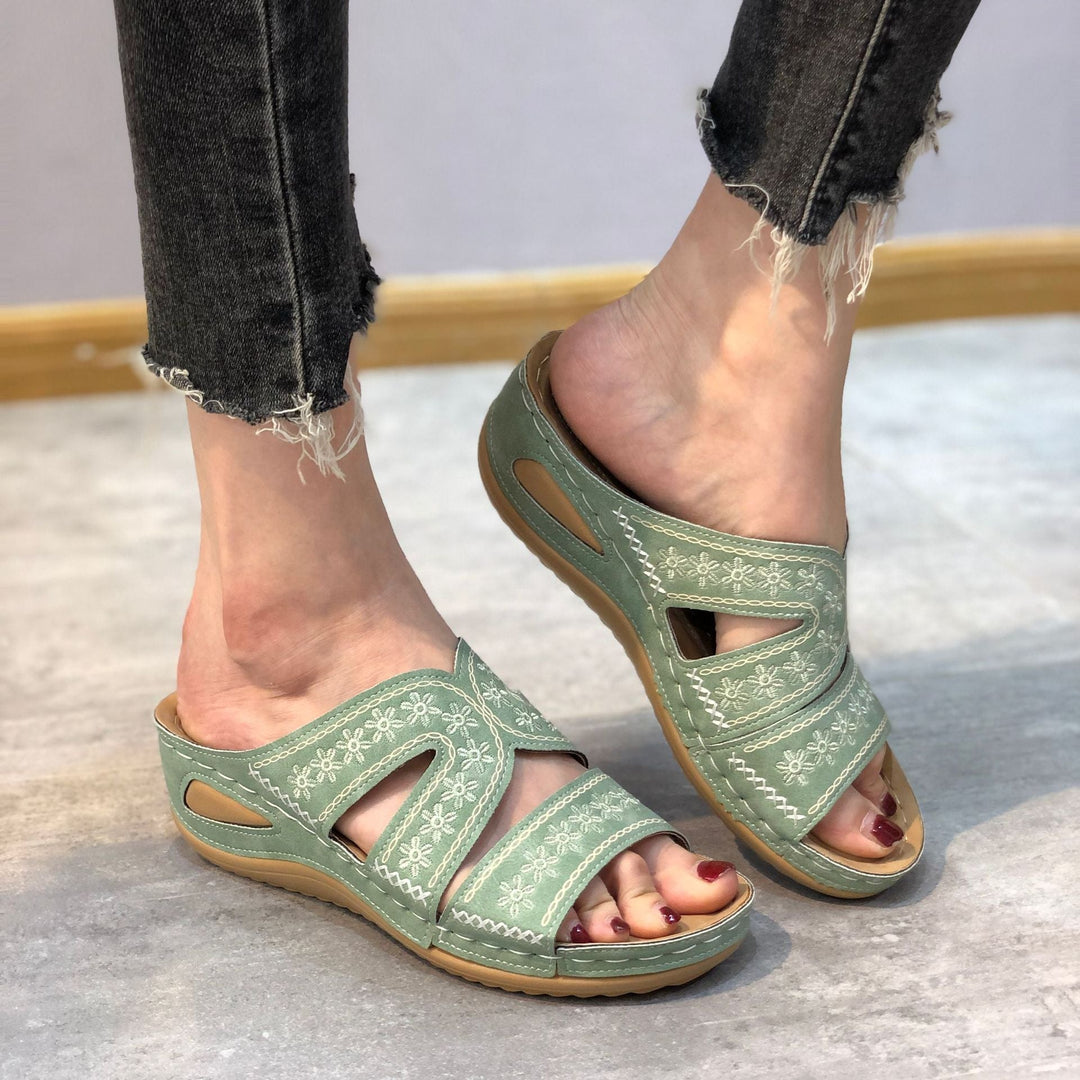 Woman wearing Maren orthopedic sandals in black paired with casual summer outfit