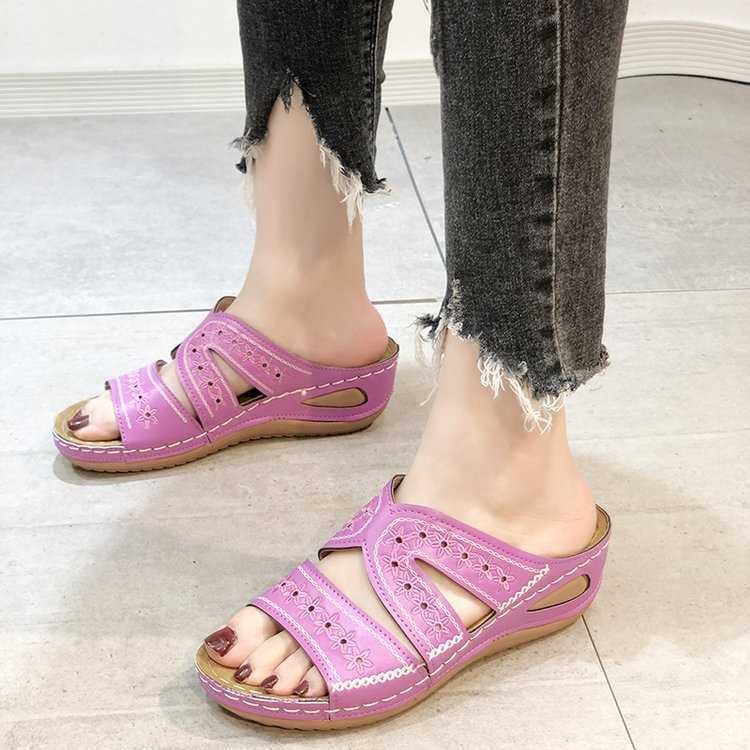 Overhead flat-lay of all six Maren sandal color options: blue, brown, black, pink, green, and purple
