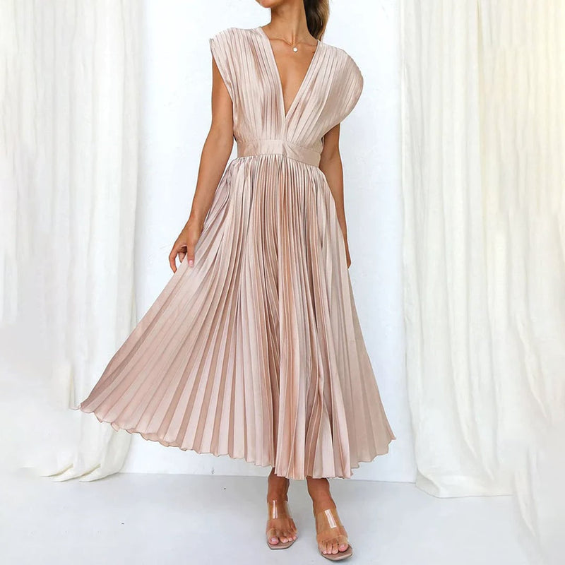Model wearing the Maren women's wedding guest dress in Champagne, front view
