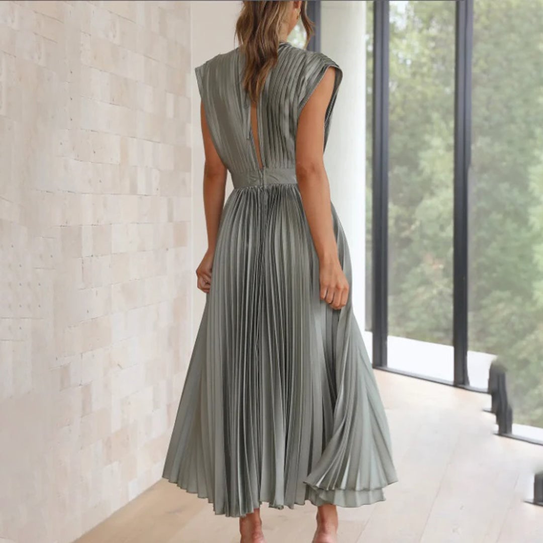 Full-length back view of the Maren dress in Blue