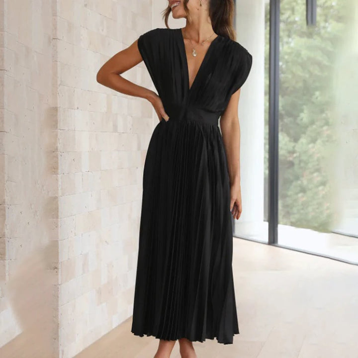 Side view of the Maren dress in Silver showing the flattering fit