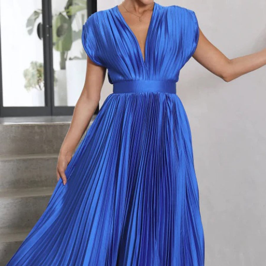 Flat lay of the Maren women's wedding guest dress showing color and fabric