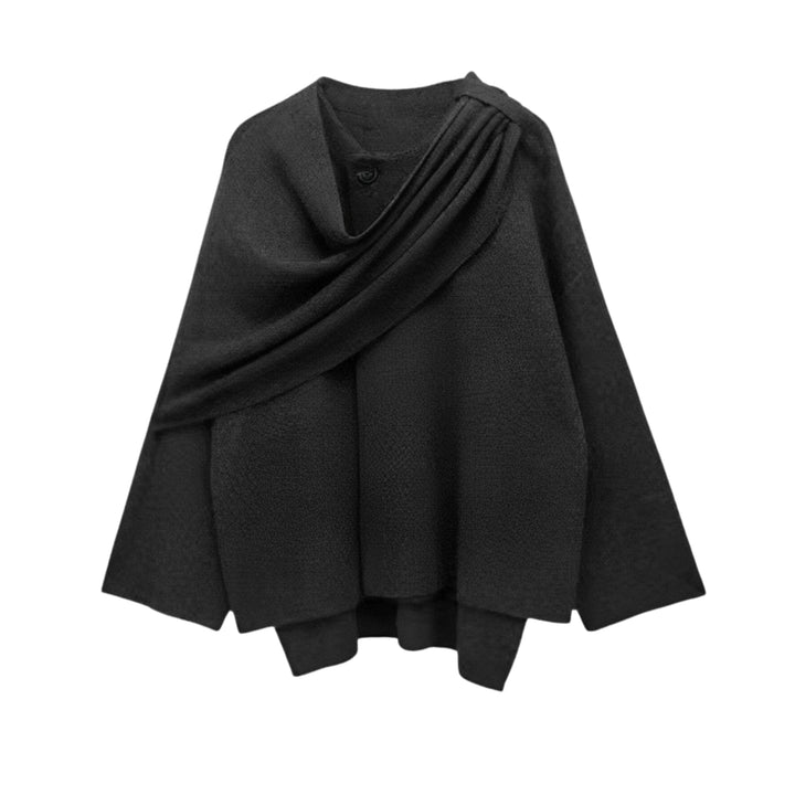Model wearing the Margaret cape mantel in a flowing draped silhouette, front view
