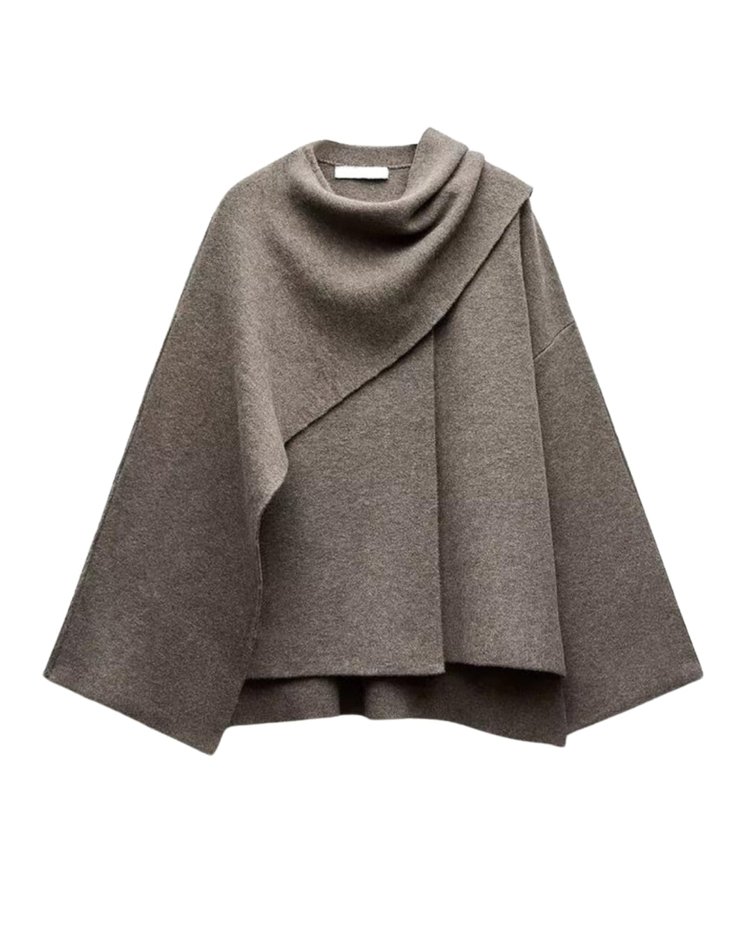 Margaret cape mantel in Black colorway, worn over a blouse and tailored pants