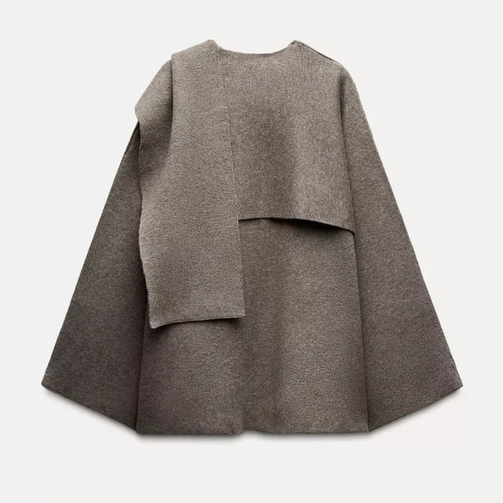Margaret cape mantel styled casually over a sweater for a relaxed weekend look
