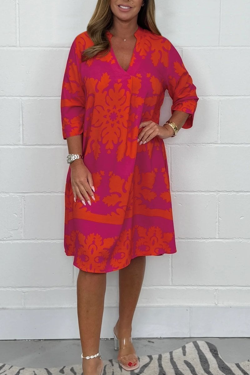 Front view of the Margaret light summer dress in red showing delicate print and relaxed fit perfect for warm-weather outings