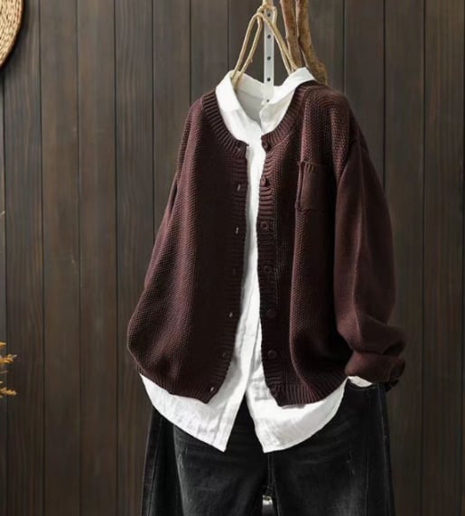 Front view of the relaxed cardigan showing its open silhouette and functional pockets