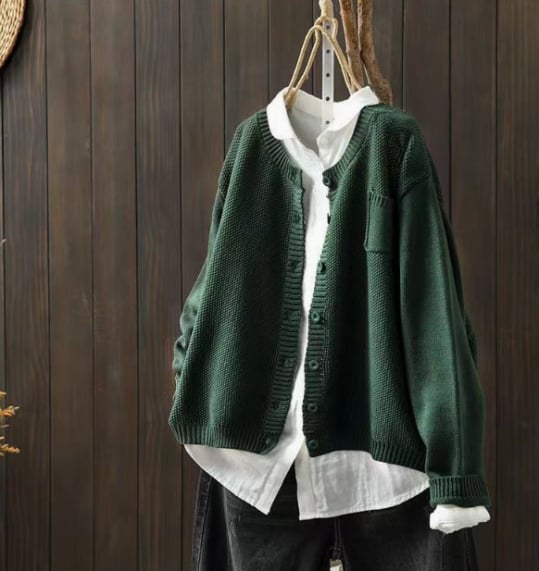 Close-up of the cardigan fabric texture highlighting its cozy, draped fit