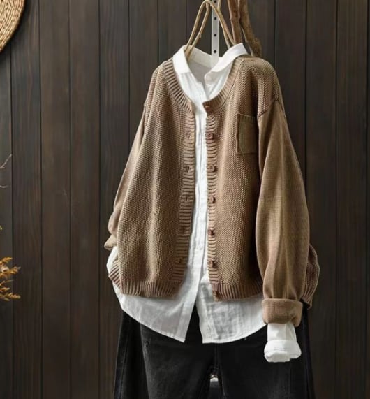 Side view of the relaxed cardigan showing pocket placement and relaxed fit