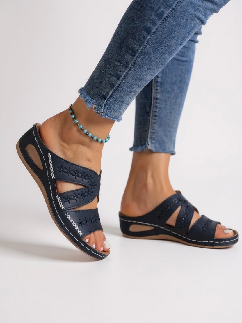 Margaux cushioned sandals in brown shown from the side on a neutral background