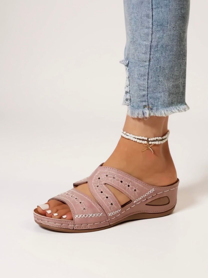 Detail shot of the padded insole of Margaux women's embroidered slide sandals