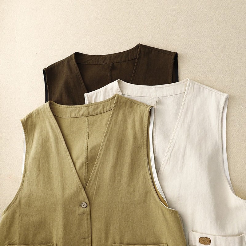 Front view of relaxed button vest draped over a casual outfit, highlighting the soft silhouette