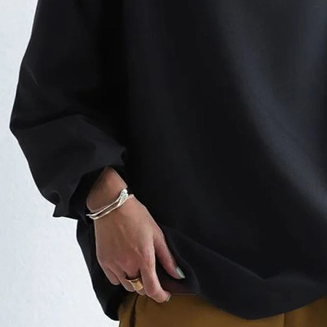 Three color options of the Margot high-neck soft knit top — black, blue, and white