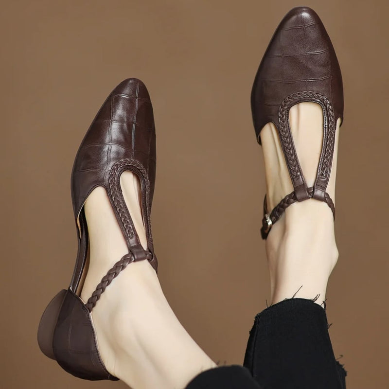 Margot leather T-strap mary jane flats in brown with pointed toe and braided strap, front view