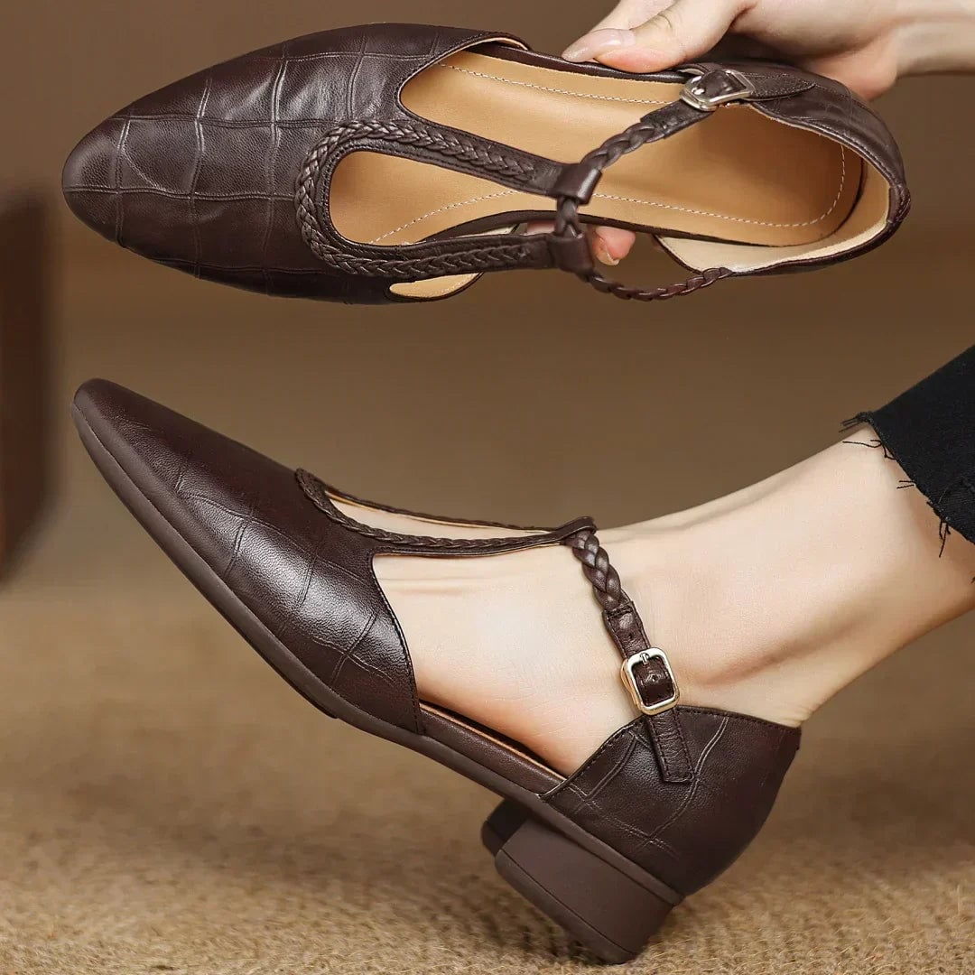 Margot leather T-strap mary jane flats in brown, side profile showing flat cushioned sole