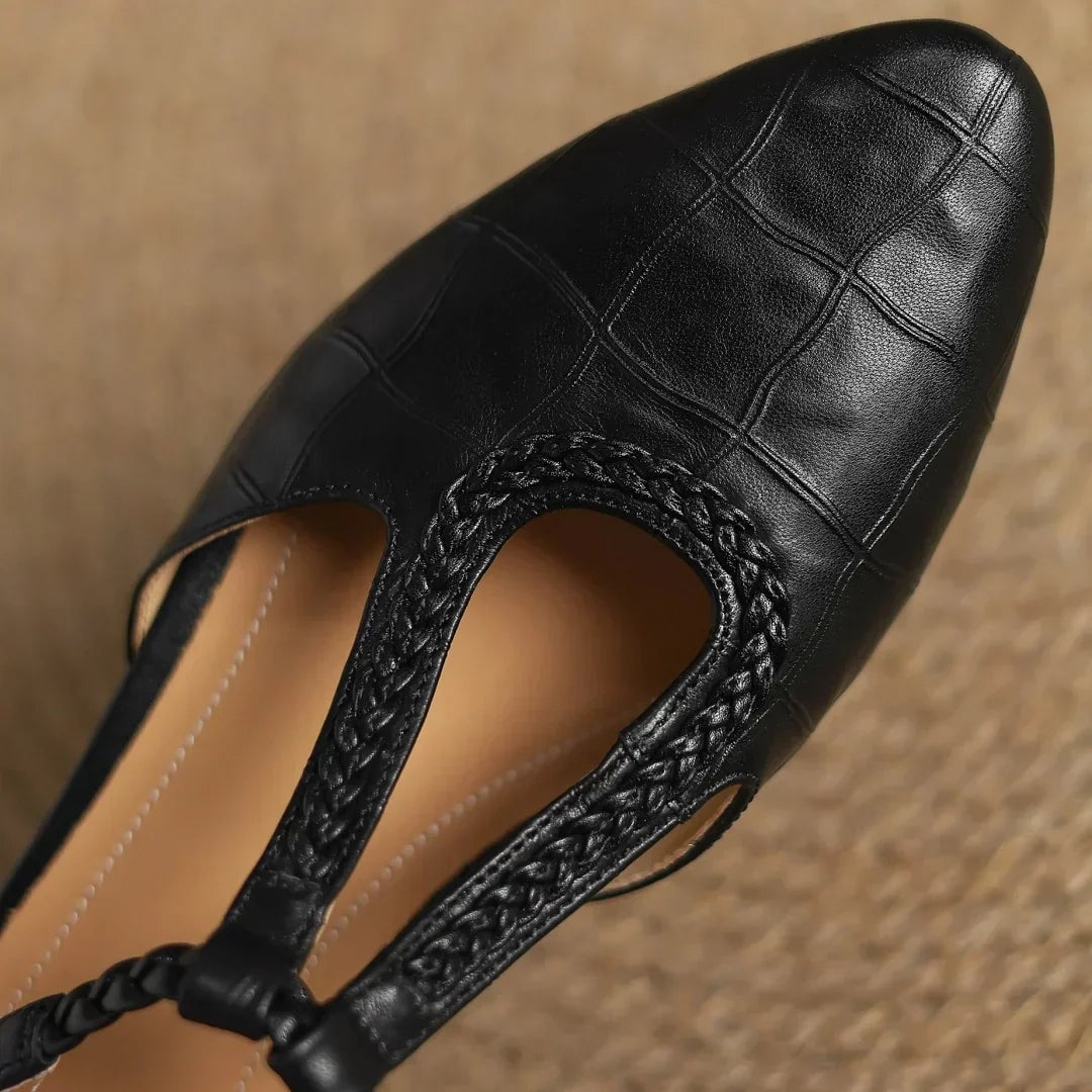Margot pointed-toe mary jane flats in black, top-down view showing full silhouette