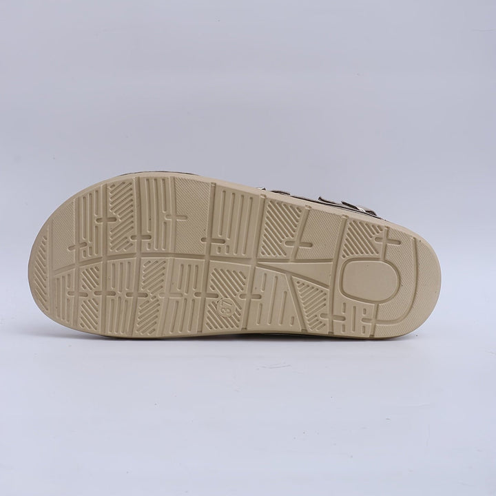 Side profile of Marguerite gray sandal highlighting the lightweight flexible sole