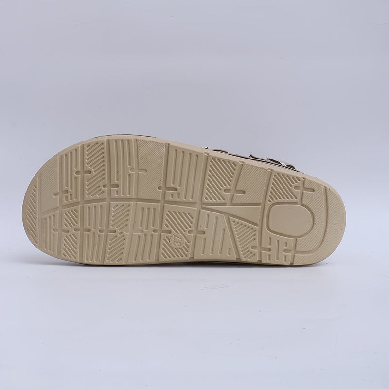 Side profile of Marguerite gray sandal highlighting the lightweight flexible sole