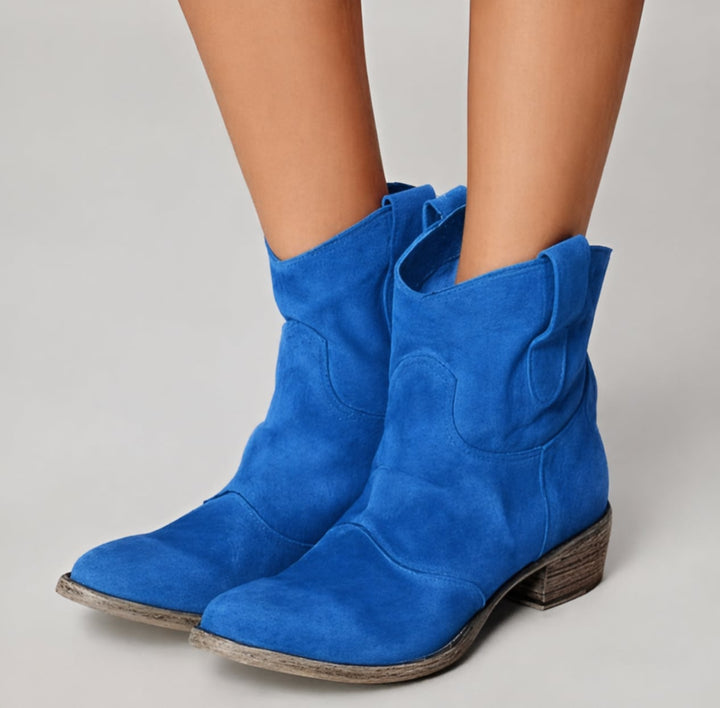 Women's suede ankle boots in blue displayed on a clean white background