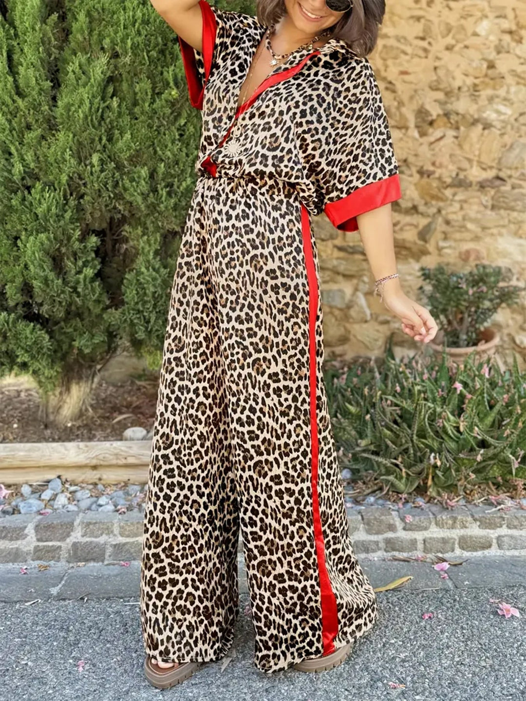 Front view of the green leopard print wide-leg set showing the relaxed drape and matching top