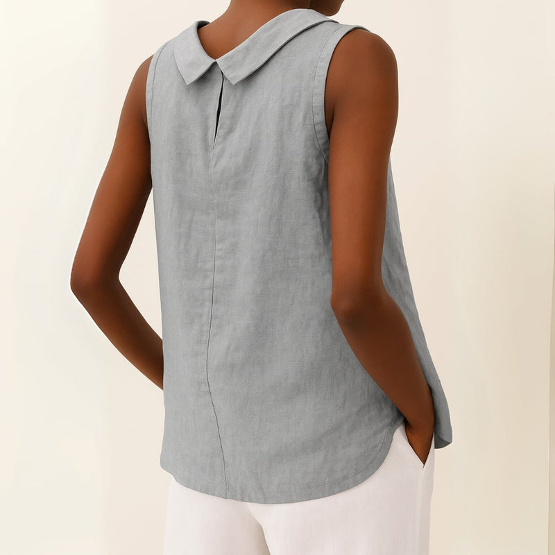Front view of sleeveless roll collar top showing the subtle rolled neckline and flattering silhouette