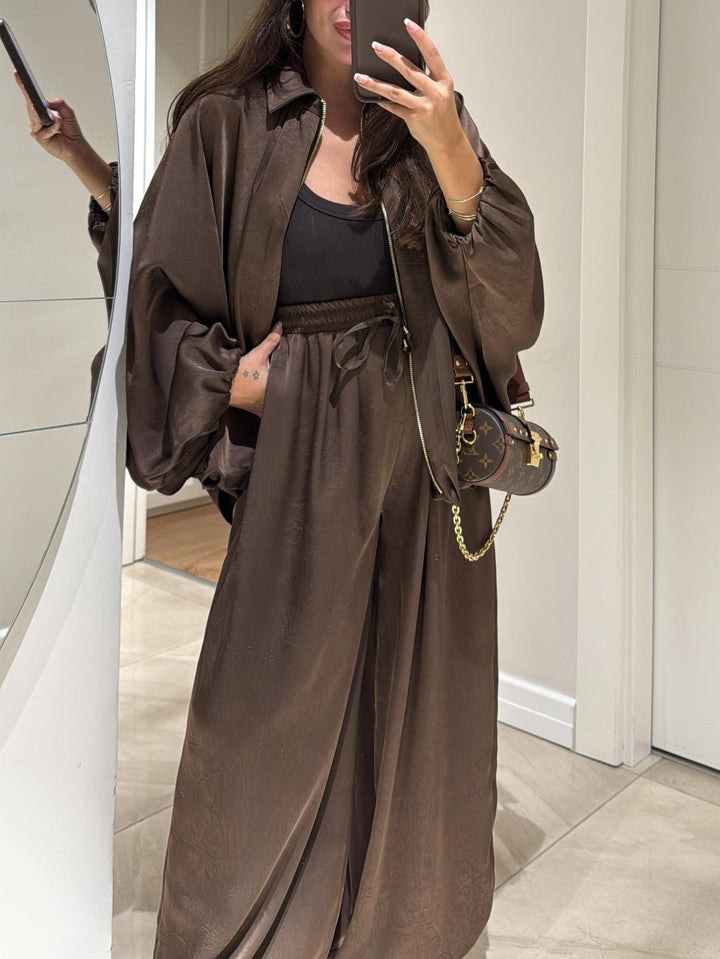 Flat lay of brown Maribel jacket and drawstring pants set