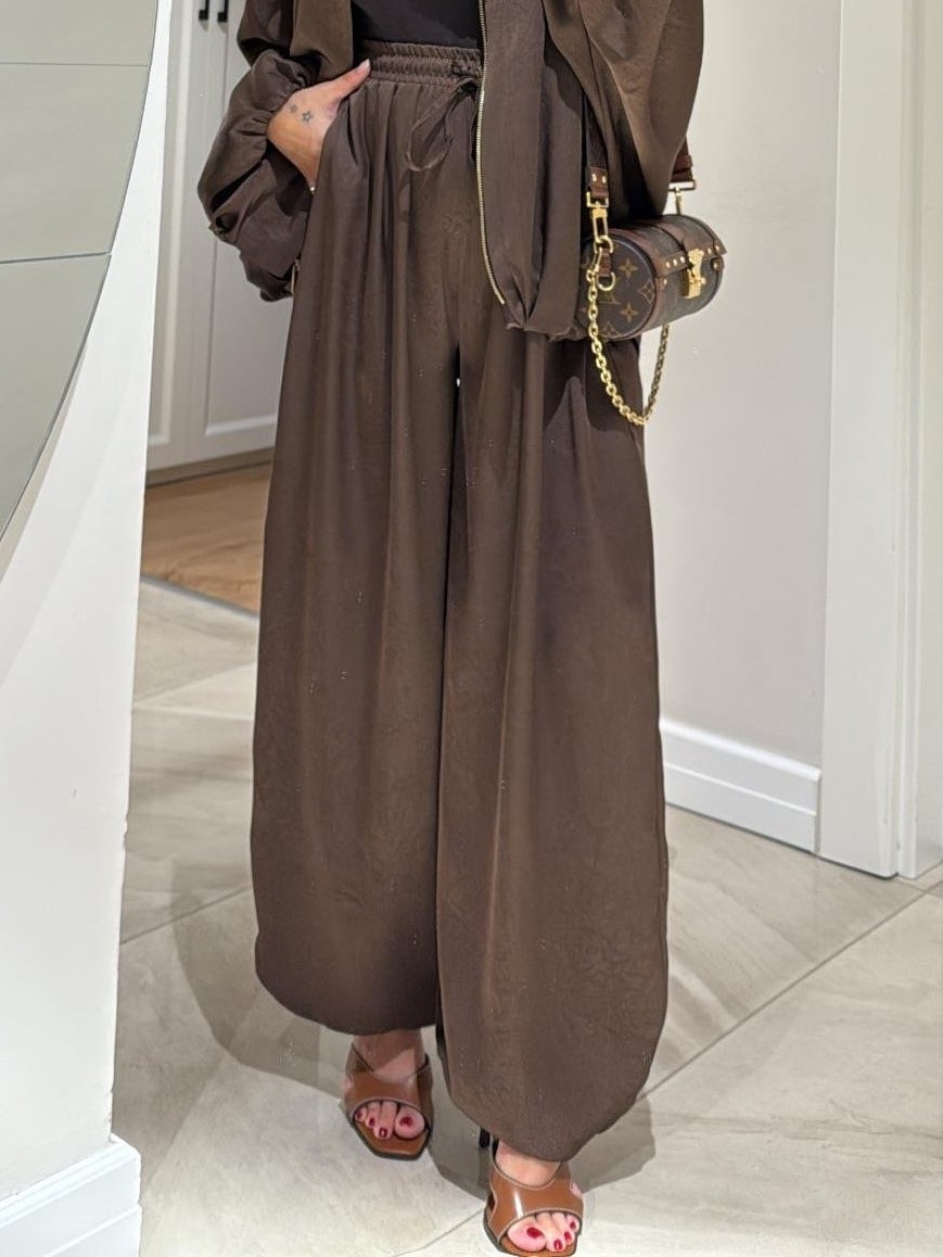 Flat lay of claret Maribel jacket and drawstring pants set