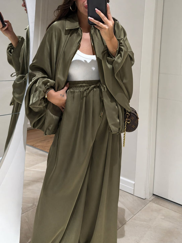 Woman in brown Maribel set styled with sneakers, casual everyday look