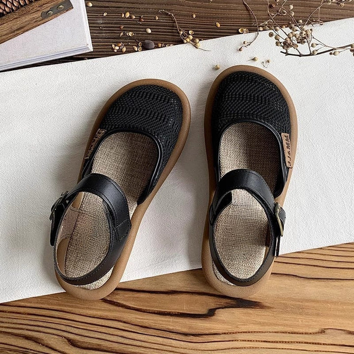Marigold wide fit cushioned adjustable sandals in black on a light background